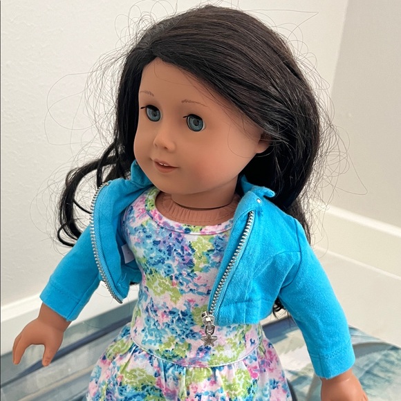 American Girl Doll with Blue Jacket & floral dress. 2017 - Picture 7 of 8